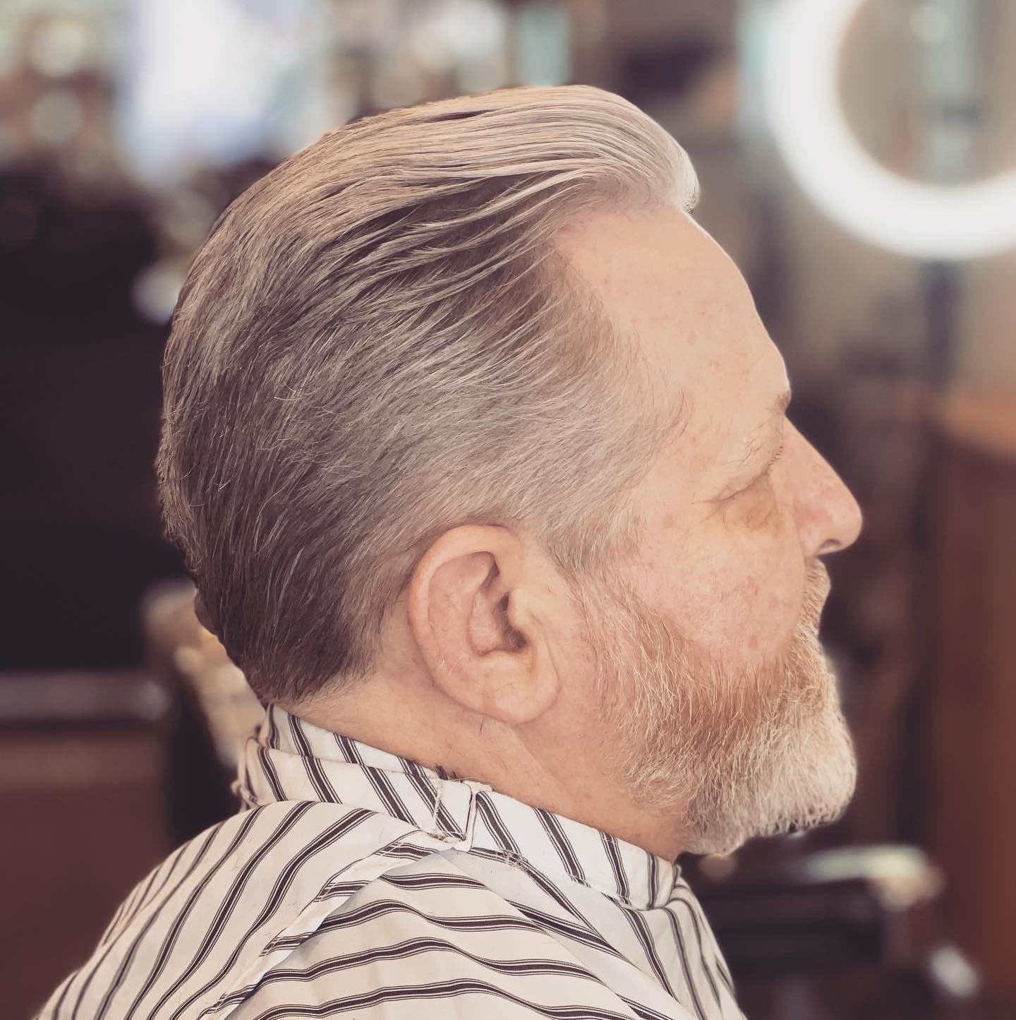 Photo d'une réalisation de coupe de cheveux