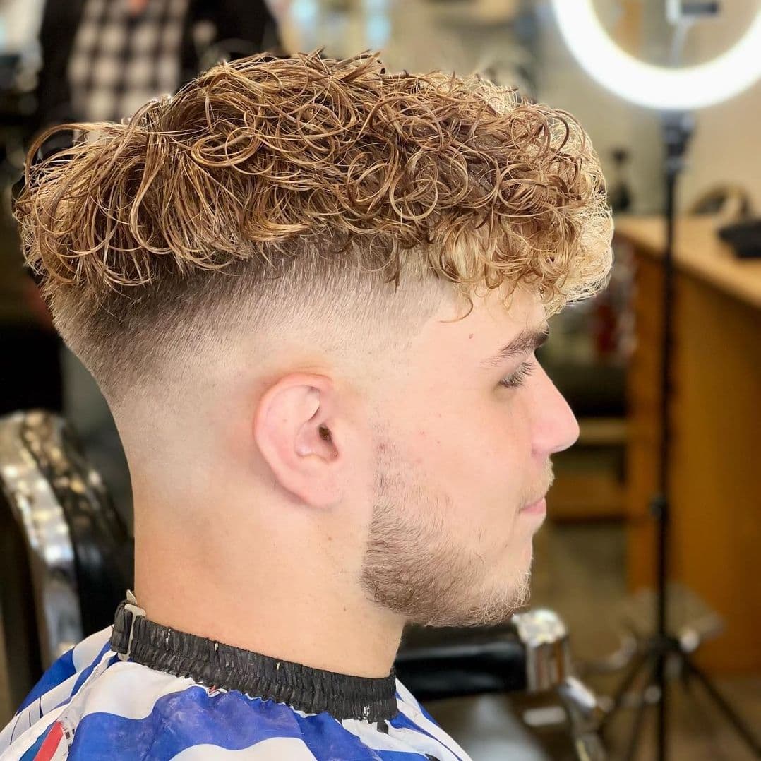 Photo d'une réalisation de coupe de cheveux
