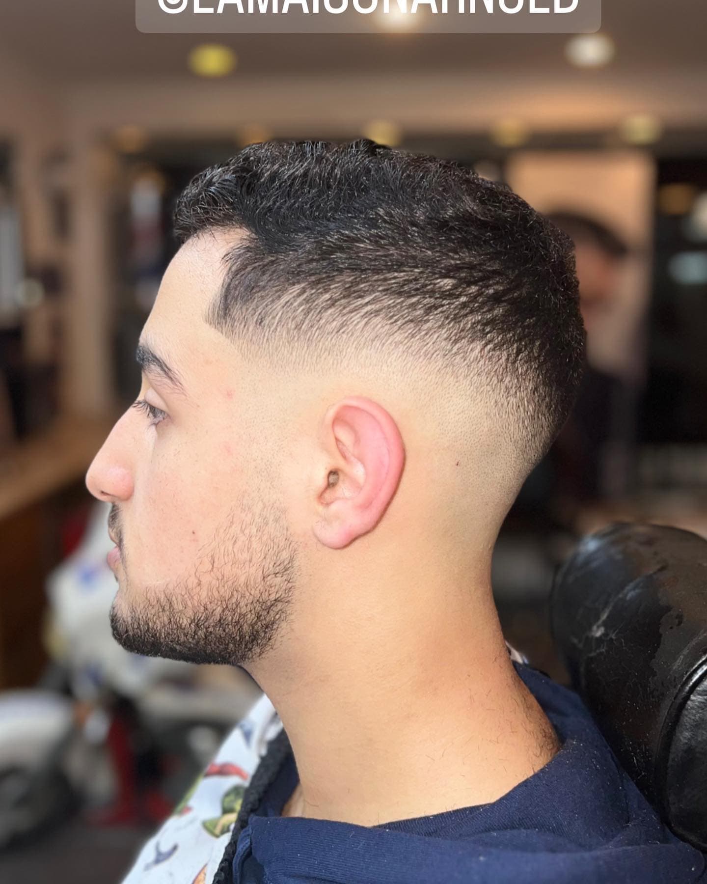 Photo d'une réalisation de coupe de cheveux