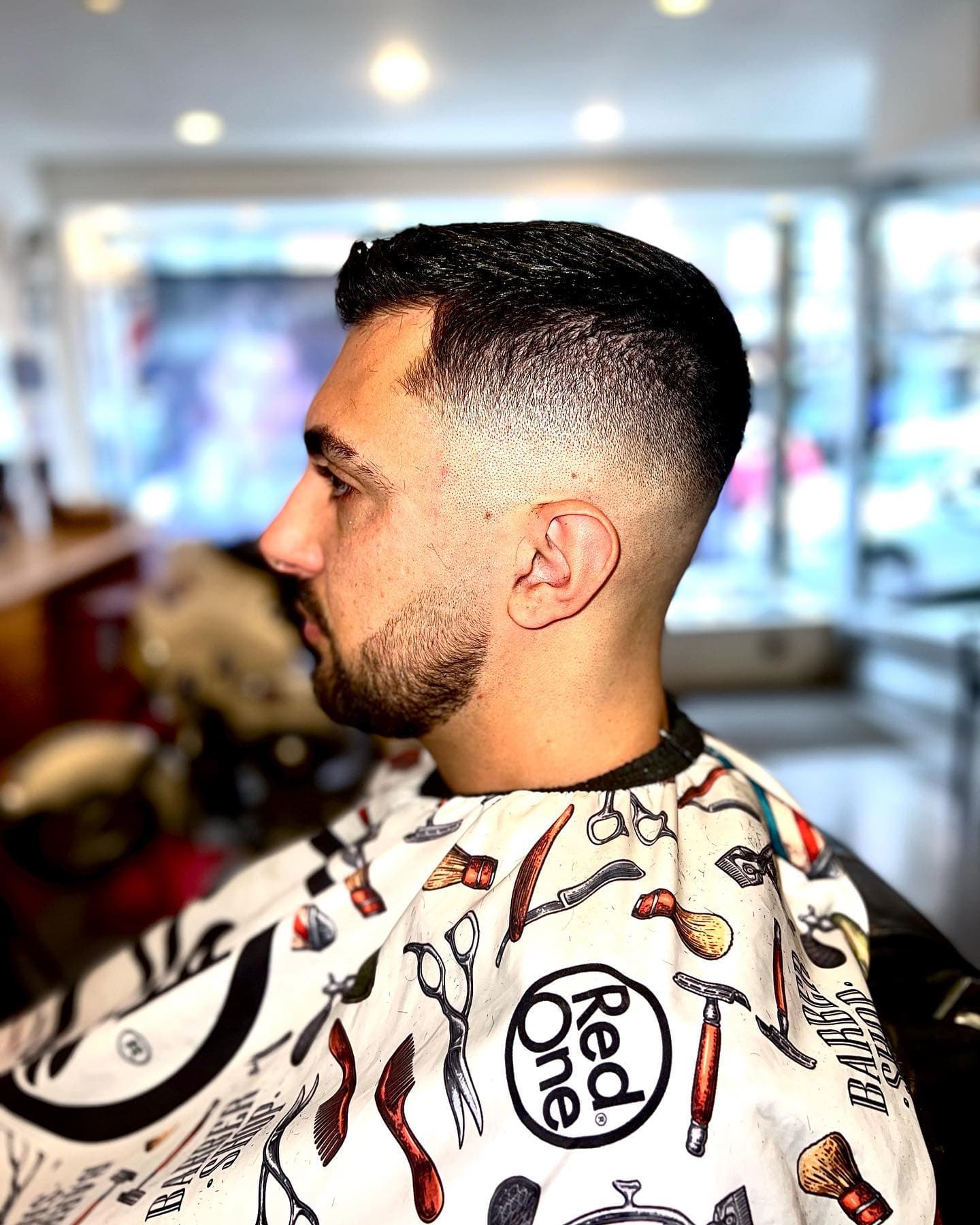 Photo d'une réalisation de coupe de cheveux